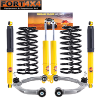 TERRAIN TAMER - Kit de rehausse +40mm pour DODGE RAM 1500 DS (2012-2019) Comprend 4 amortisseurs + 2 ressorts avant + 2 triangles renforcés supérieurs