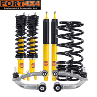 TERRAIN TAMER - Kit de rehausse combiné assemblé +40mm pour DODGE RAM 1500 DT (2019+) Comprend : 4 amortisseurs, 2 ressorts avant, 2 ressorts arrière, 2 triangles renforcés supérieurs